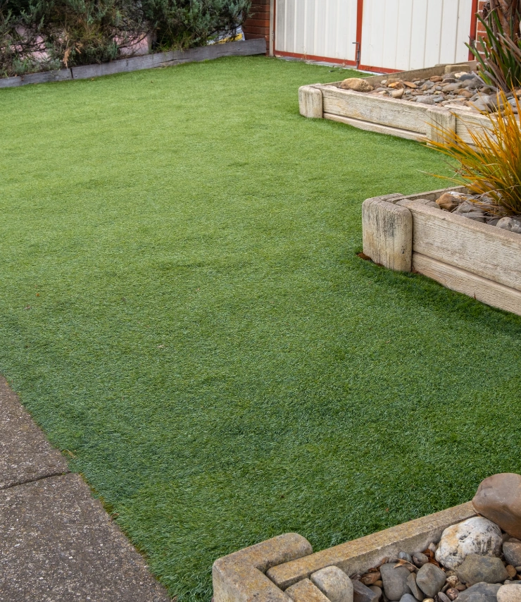 Professional synthetic grass landscape designed for a Dallas home
