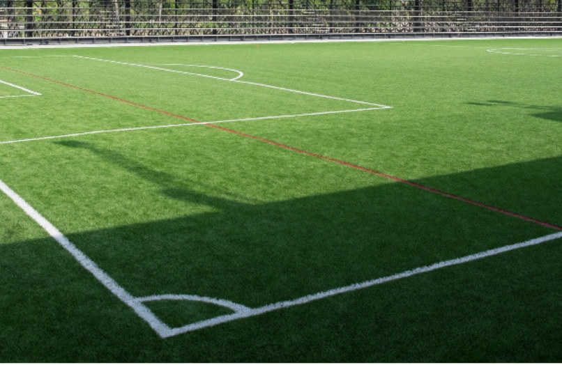 Completed commercial artificial turf installation at a business property in Dallas